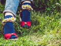 Women`s legs, fashionable shoes and bright socks Royalty Free Stock Photo