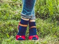 Women`s legs, fashionable shoes and bright socks Royalty Free Stock Photo