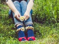 Women`s legs, fashionable shoes and bright socks Royalty Free Stock Photo