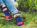 Women`s legs, fashionable shoes and bright socks Royalty Free Stock Photo