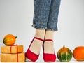 Women`s legs, fashionable shoes and colorful socks Royalty Free Stock Photo