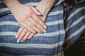 Women's manicure on a background