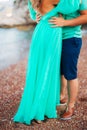 Women`s and men`s feet in the sand Royalty Free Stock Photo