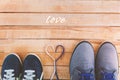 Women`s and men`s shoes with laces from the heart Royalty Free Stock Photo