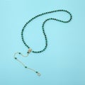 Women`s necklace of green malachite gem stones Royalty Free Stock Photo