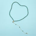 Women`s necklace of green malachite gem stones Royalty Free Stock Photo