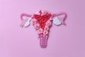 The women`s reproductive system. The concept of women`s health. Paper flowers Royalty Free Stock Photo