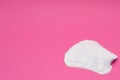 Women`s daily sanitary pads on a pink background, close-up, copy space, menstruation Royalty Free Stock Photo