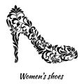 Women`s shoe from a floral ornament a white background