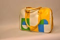 Women`s sports or school bag in yellow, white, blue, green colors. Royalty Free Stock Photo