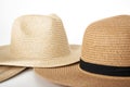 Women`s straw hats overlaid on white background Royalty Free Stock Photo