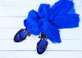 Women`s stylish sandals and a blue scarf Royalty Free Stock Photo