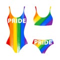 Women`s swimsuits with PRIDE lettering in rainbow LGBT flag colors.