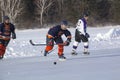 Women`s teams compete in a Pond Hockey Festival in Rangeley. Royalty Free Stock Photo