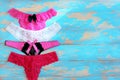 Women`s underwear set on blue background with copy space Royalty Free Stock Photo