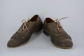 Women`s unusual gray brown shoes, shoes from genuine leather in the English style.