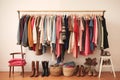 Women\'s wardrobe. Clothes rail with hangers. Concept of clothing and shopping and nothing to wear