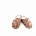 Women`s warm home slippers. Made of pink embossed plush Royalty Free Stock Photo