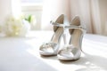 Women\'s wedding open high heel shoes close-up on light background. preparing the bride for wedding Royalty Free Stock Photo