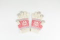 Women`s winter knitted mittens on a white background Royalty Free Stock Photo