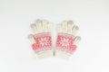 Women`s winter knitted mittens on a white background Royalty Free Stock Photo