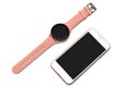 Women`s wrist smart watch with a pink strap and a smartphone on a white background. Isolated Royalty Free Stock Photo