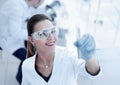 Women scientist with test tube making research in clinical laboratory Royalty Free Stock Photo