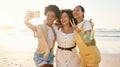 Women, selfie and peace sign with friends at beach for support, social media and diversity. Smile, relax and profile