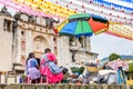 Women sell food outside church, San Juan del Obispo, Guatemala