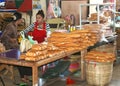 Woman is selling original fresh French baguettes, Vientiane, Laos