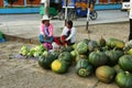 Women selling watermelons in a stall in Yungay, Peru