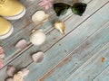 Women shoes , Relax Time Sneakers yellow shoe , sunglasses ,seashell and flowers on pink blue background ,clothes accessories s