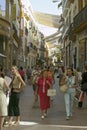 Women shop in old section of city of Sevilla, Andalucia, Southern Spain