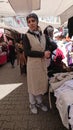 Women shoppers in the Istanbul street market choose goods