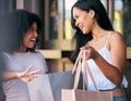 Women, shopping bag and retail promotion conversation in shopping market street for luxury fashion, financial discount