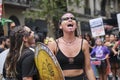 Women shouting feminist slogans while marching during the 8M women strike