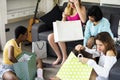 Women showing friends shopping shoes Royalty Free Stock Photo