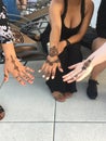 Women showing off hand henna tattoos Royalty Free Stock Photo