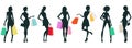 Women silhouettes with shopping bags. Isolated vector illustration. Royalty Free Stock Photo