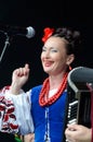 Women singing ukrainian song in traditional clothe