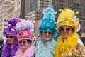 Women in single color costumes at the Easter Bonnet Parade