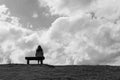 A women sitting alone on a bench waiting for love Royalty Free Stock Photo