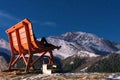 Women sitting on big bench in mountains Prato nevoso resort at night in Piedmont Alps Italy Royalty Free Stock Photo