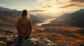 Women sitting on a cliff overlooking the lake, concepts of winner, freedom, happiness Royalty Free Stock Photo