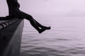 Woman sitting and feeling depression with having a headache at sea,Mental disorder health care,World suicide prevention day concep Royalty Free Stock Photo