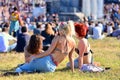 Women sitting in the grass at Heineken Primavera Sound 2014 Festival (PS14) Royalty Free Stock Photo