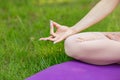 Women sitting in lotus pose, meditating or praying. Healthy lifestyle Royalty Free Stock Photo