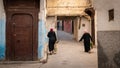 Women in the small street of Medina, Fez, Morocco Royalty Free Stock Photo