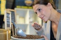 Women smell coffee beans Royalty Free Stock Photo