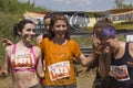 Women smiling after the mud run Royalty Free Stock Photo